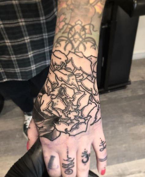traditional hand tattoo of a hand