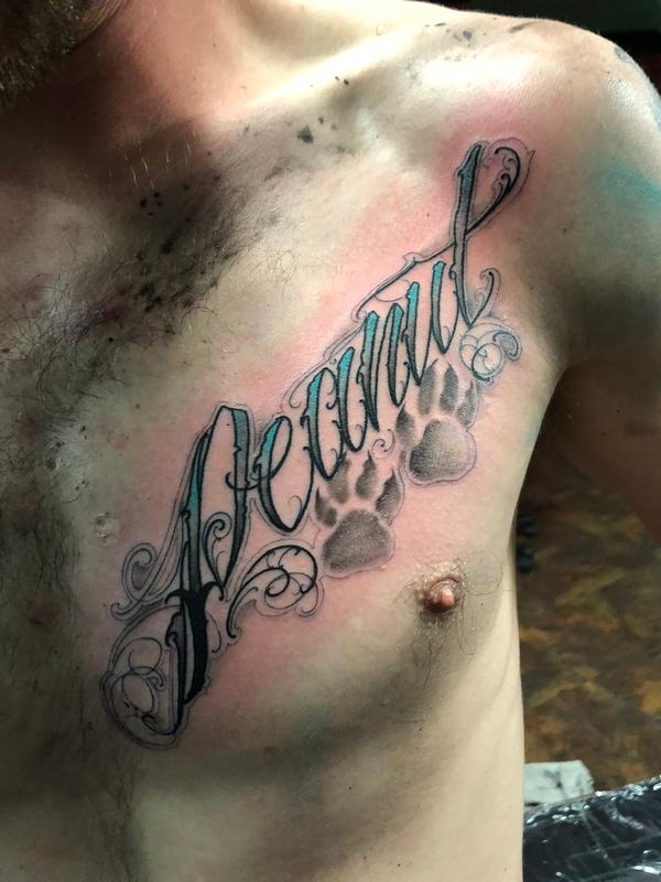 Script Chest Tattoo by Billy Williams Tattoos