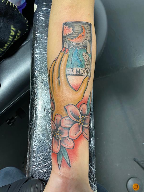Art Immortal Tattoo : Tattoos : Half-Sleeve : Lillies & Hand holding Tarot Card Art Immortal Tattoo : Tattoos : Half-Sleeve : Lillies & Hand holding Tarot Card