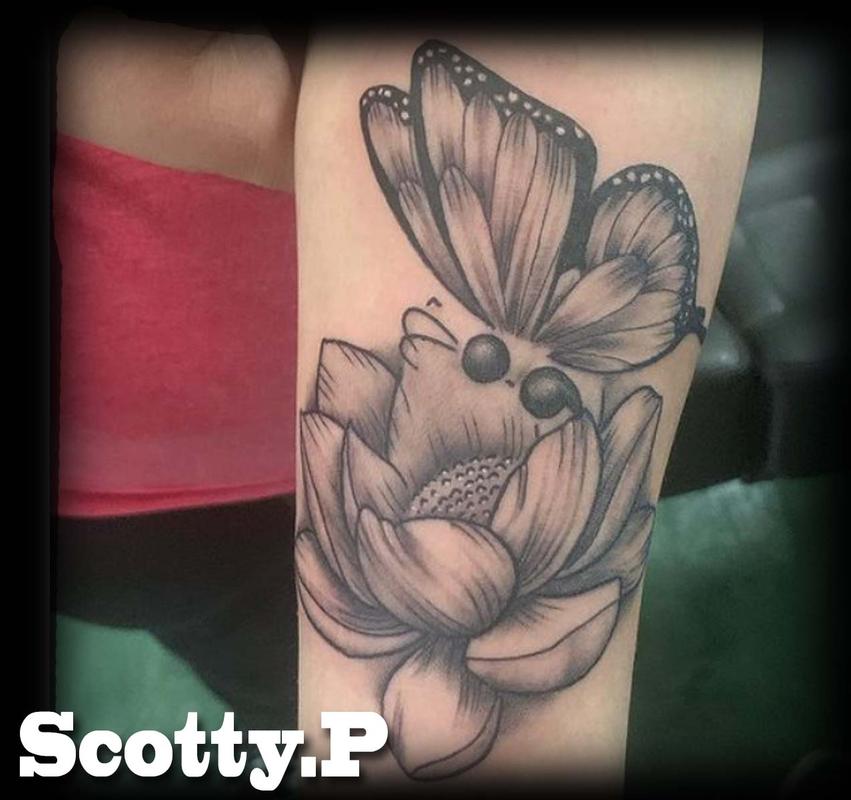 Daddy Jacks Body Art Studio : Tattoos : Body Part Arm : A butterfly on a Lotus  flower