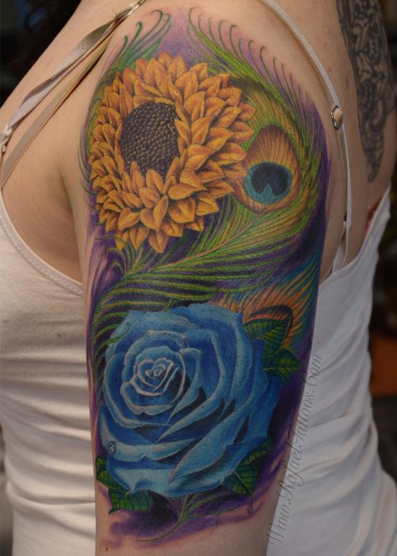 Full colored blue rose and sunflower with peacock feathers arm tattoo by  Rafael Marte : Tattoos