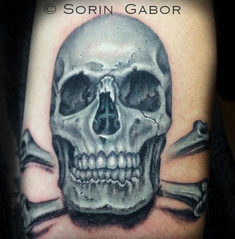 Realistic black and opaque gray skull tattoo on forearm by Sorin Gabor :  Tattoos