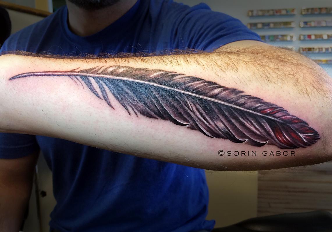 Sorin Gabor at Sugar City Tattoo : Tattoos : Realistic : Realistic black  and gray with color accent feather on forearm