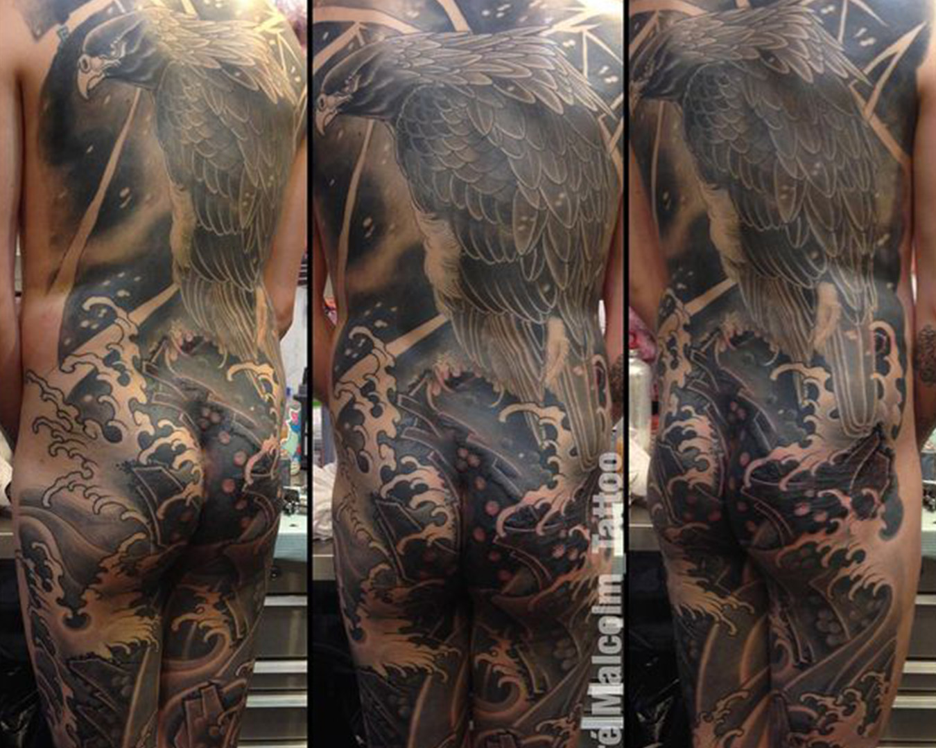 Falcon on Rock with Lightning and Waves large scale japanese back tattoo by andre malcolm