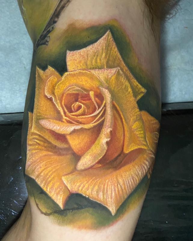 realistic orange rose tattoo