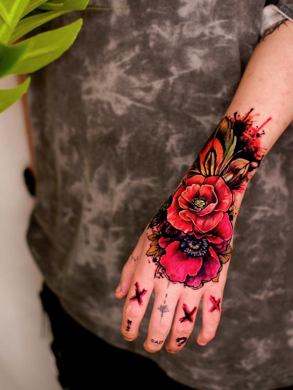 black rose hand tattoos