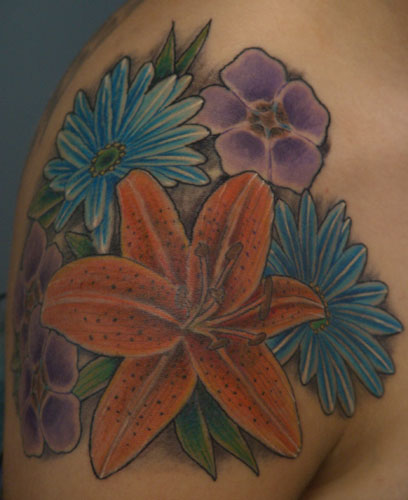 Bold Flower Tattoos Celebrate the Delicate Strength of Beautiful Blooms