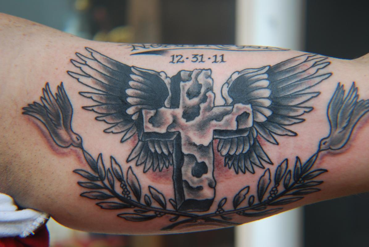 cross tattoos with banners and wings
