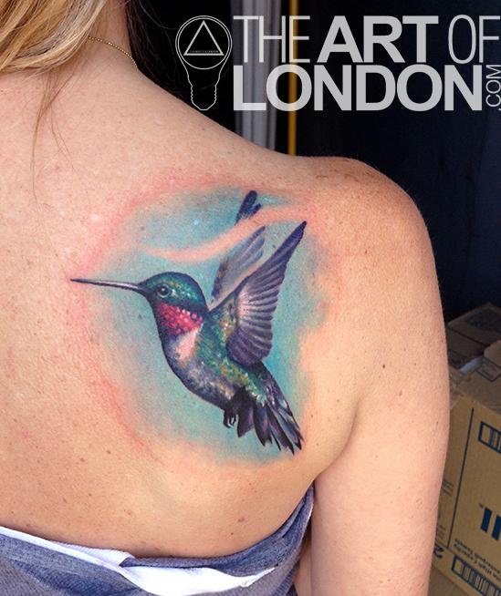 Rafael Marte Tattoos  Tattoos  Wings  Realistic hummingbird with flower  petals tattoo on aged skin