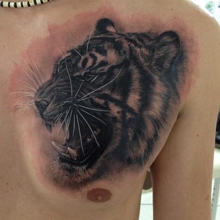 tiger face chest tattoo