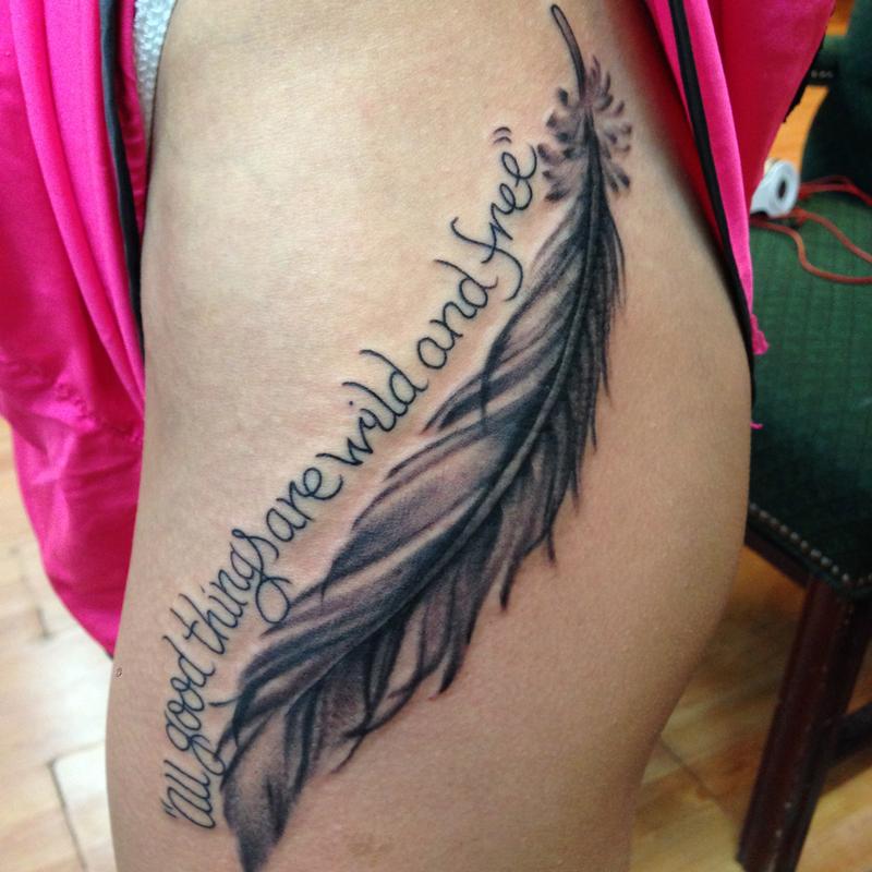Large Feather Tattoo On Rib