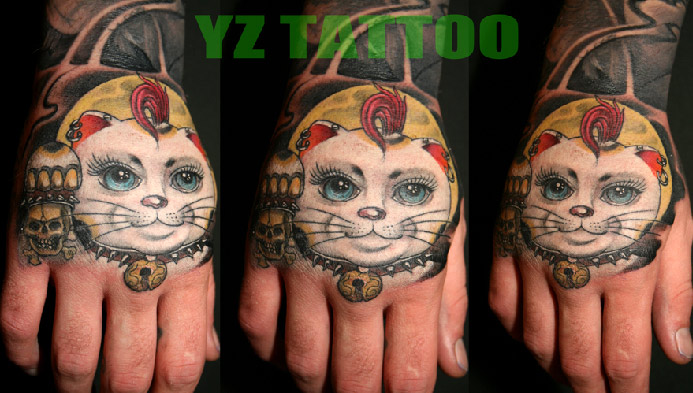 Wonderful Cat Face Tattoo On Left Hand