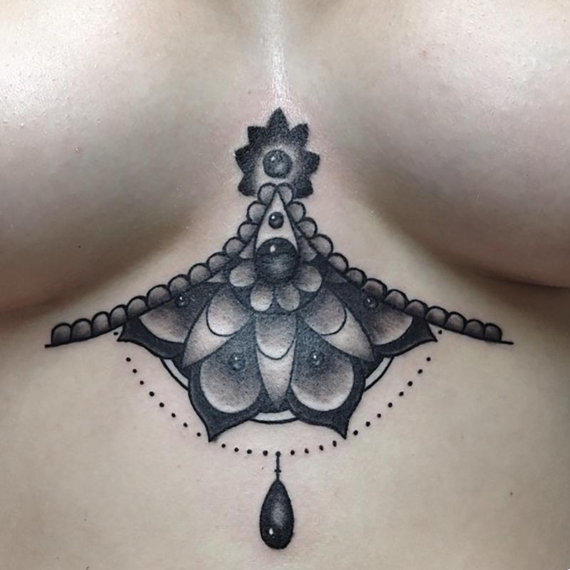 sternum mandala tattoo