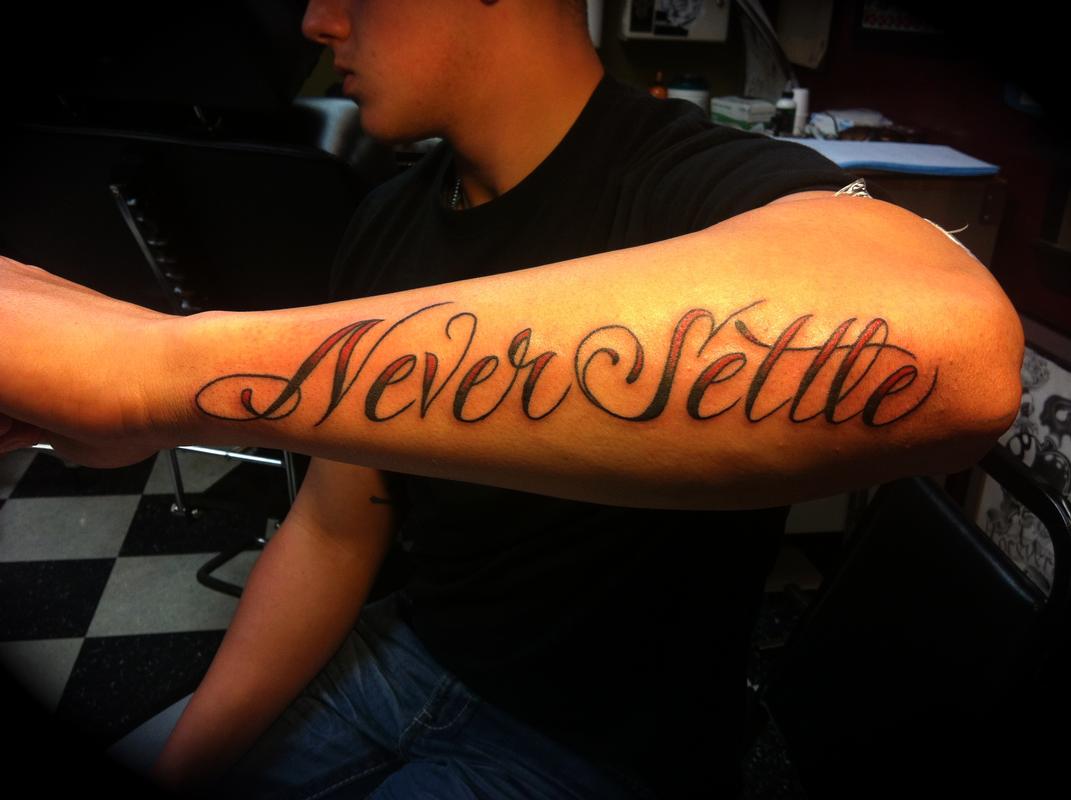 Never Settle By Tyson Tattoonow