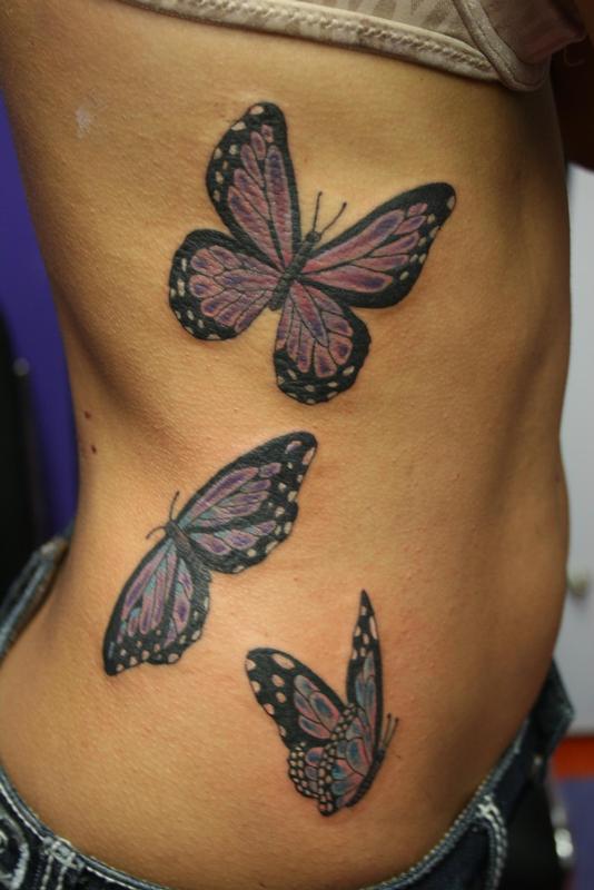 butterfly tattoo on side