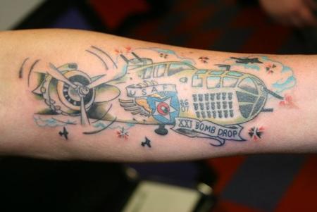 fighter plane by john glessner @ key city tattoo frederick :  r/traditionaltattoos