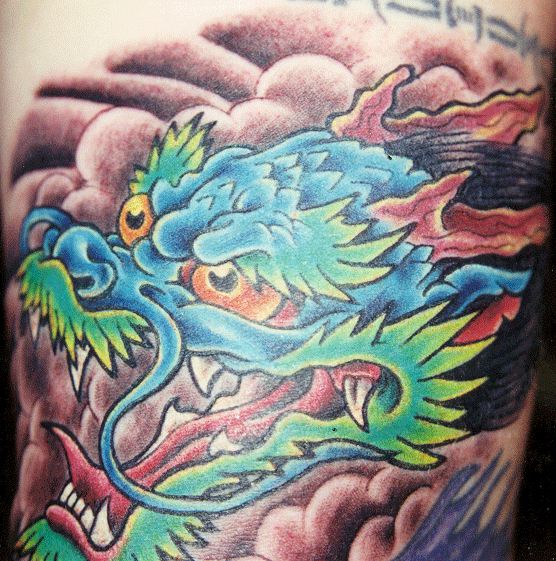 Dragon Head Tattoo Design – Tattoos Wizard Designs