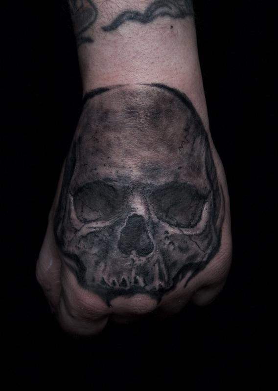 Black And Grey Tattoo Skull On Hand By Ben Licata Tattoonow