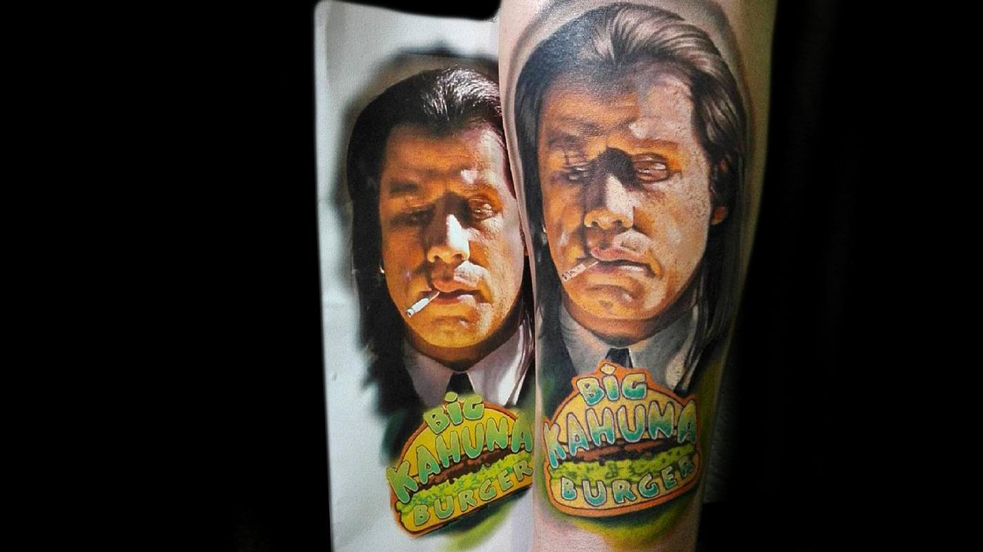Pulp Fiction themed tattoo located on the inner