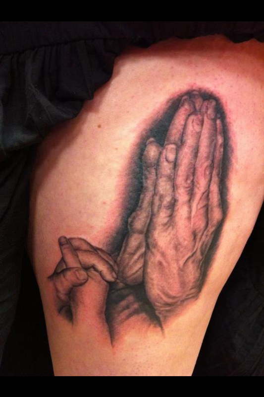 prayer hands tattoo with cross