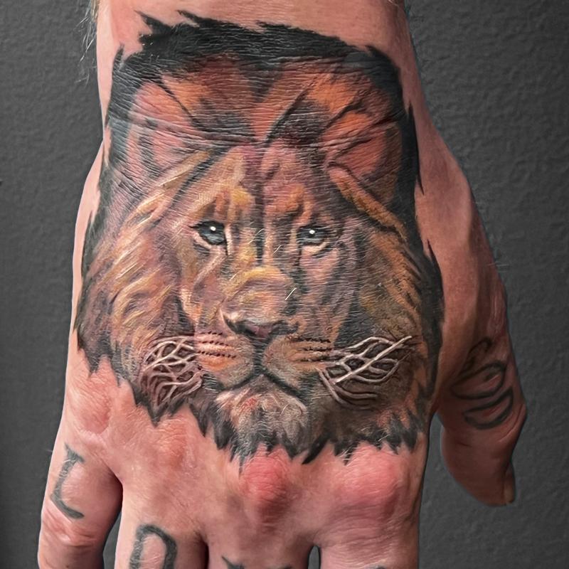 41 Best Lion Tattoos On Hand  Tattoo Designs  TattoosBagcom