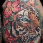 Tattoos - tiger hiding behind some apple blossoms - 99629