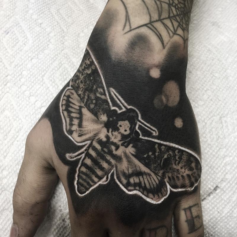 Moth hand by matt at Remington tattoo in San Diego CA : r/tattoos