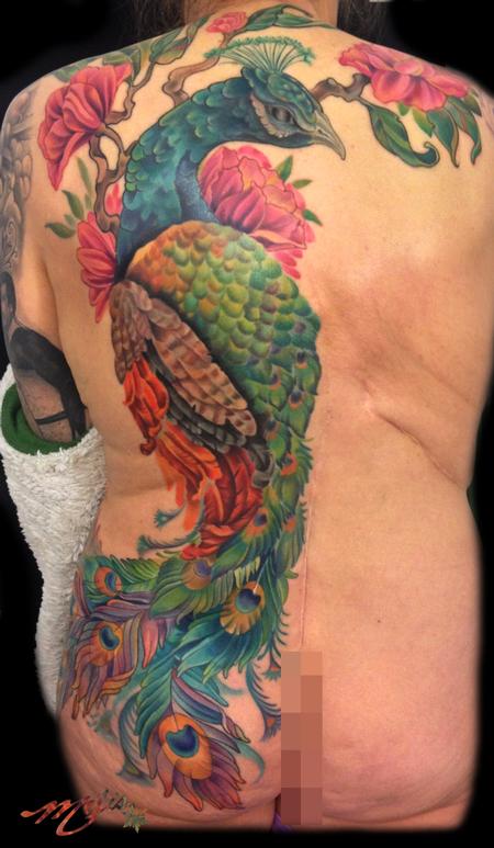 Peacock half back to front upper thigh by Melissa Fusco: TattooNOW