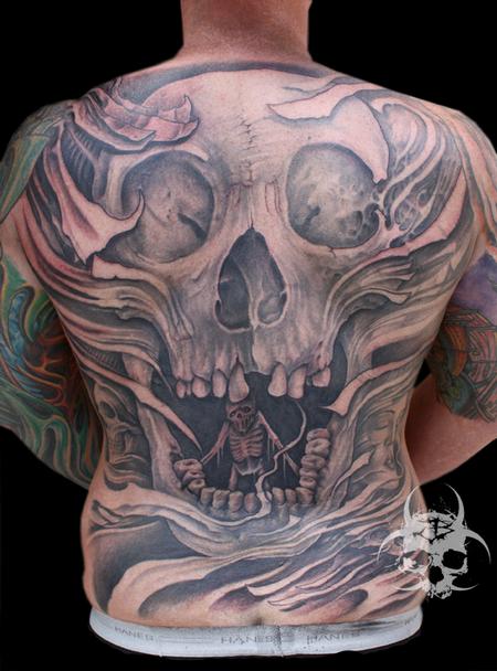Lexica - Men back tattoo of a woman fairy skull religious