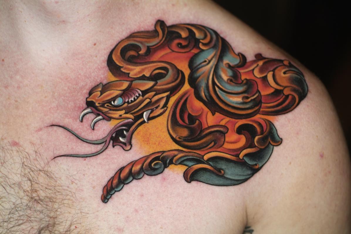 ornamental snake by Russ Abbott TattooNOW