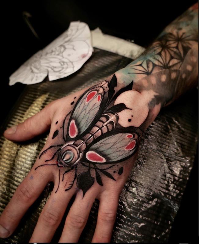 traditional hand tattoo of a hand