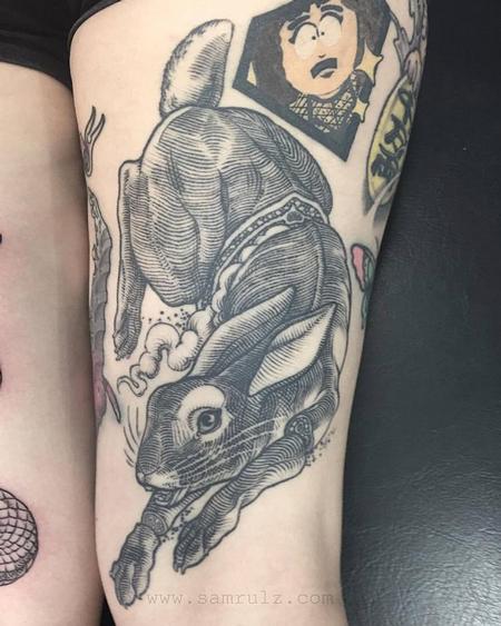 Micro rabbit tattoo - Tattoogrid.net