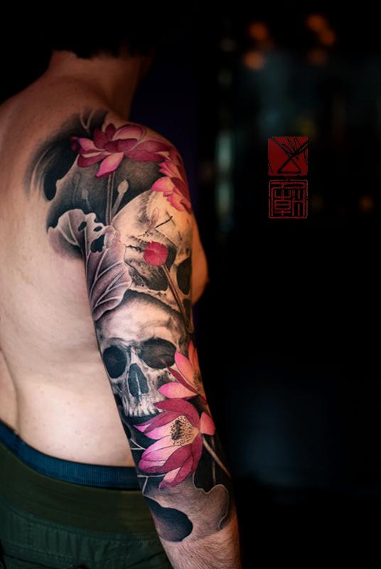 Skull and Lotus Sleeve by Joey Pang TattooNOW