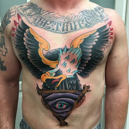 Eagle Tattoo with Striking Blue Eyes