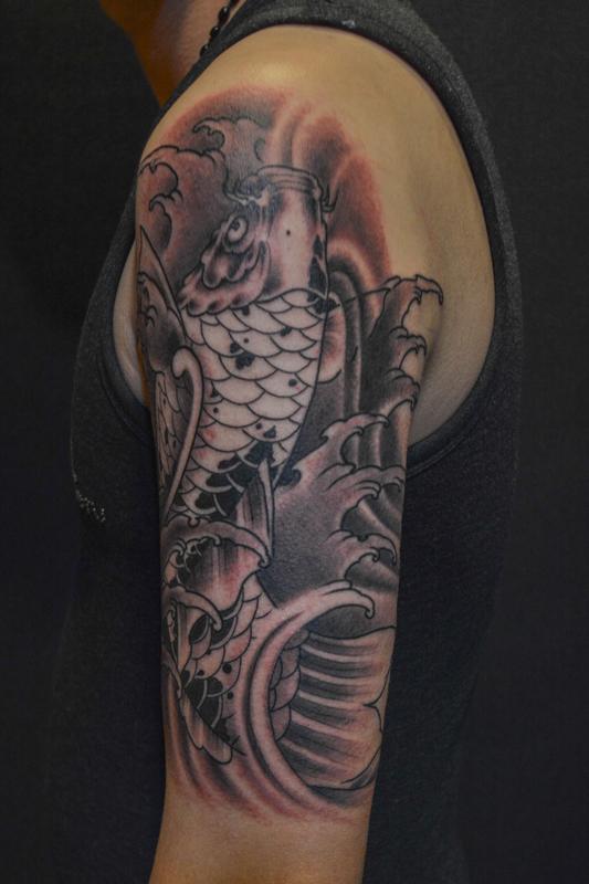 Black and Grey Koi Fish with Waves by Gao Feng: TattooNOW