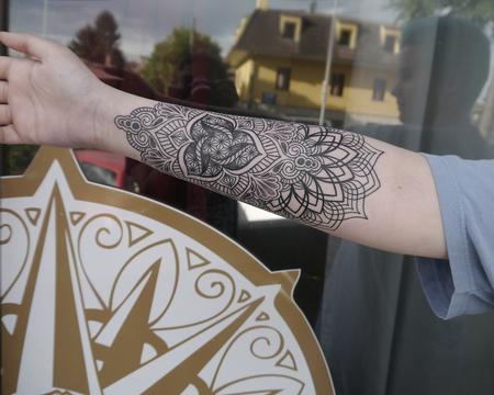 dotwork linework mandala tattoo by Obi: TattooNOW