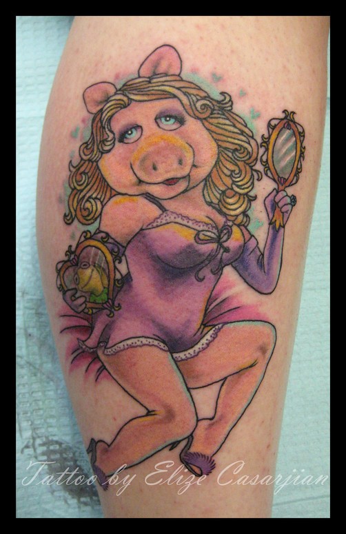 She has Miss Piggy tattooed on her arm lol   9GAG