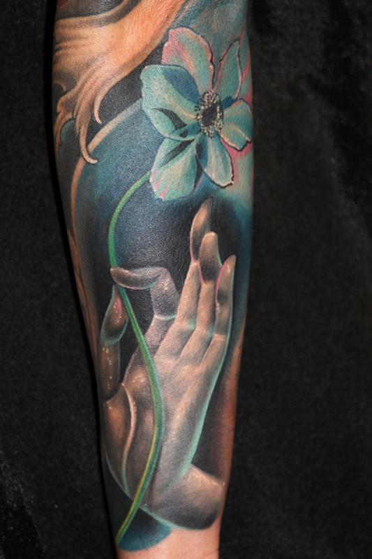 Finally extended my tea garden sleeve onto my hand Buddha head with  Japanese Maple leaves done by Sam Laurent at White Buffalo Gallery in  Sacramento CA  rtattoos