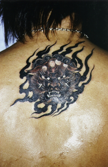 tribal dog head tattoo