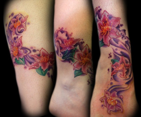 Graphic style flower tattoo on the upper back