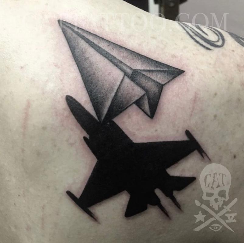origami plane tattoo