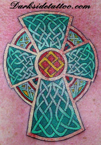 Celtic cross overgrown with ivy tattoo idea | TattoosAI