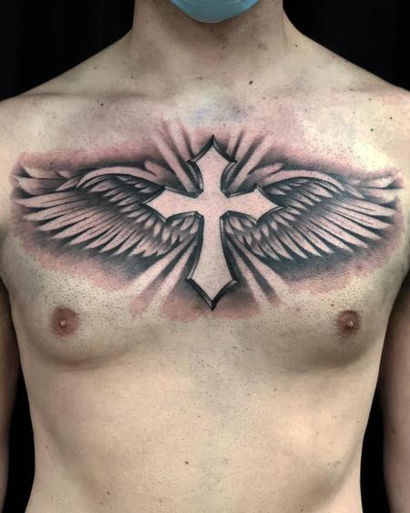 angel wings tattoo with cross
