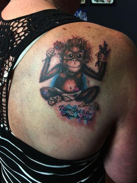 Funny colored little monkey baby tattoo pattern on the shoulder