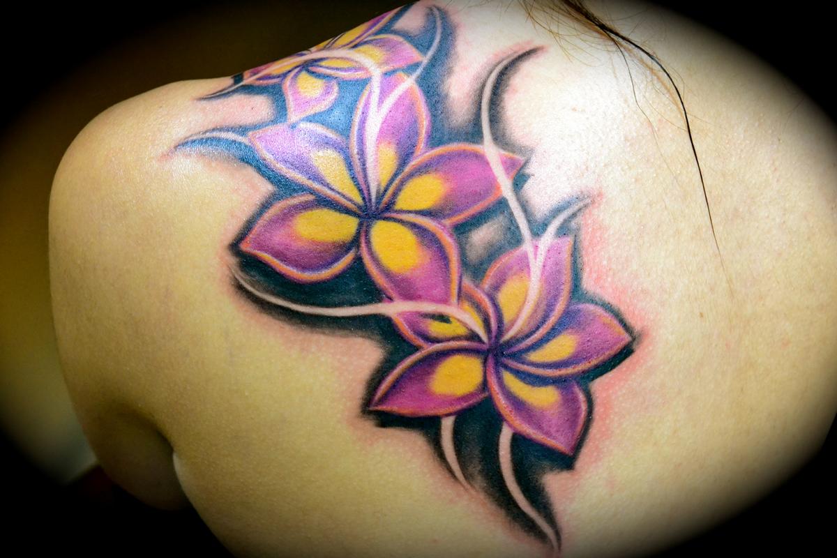 plumeria flower tattoo hip