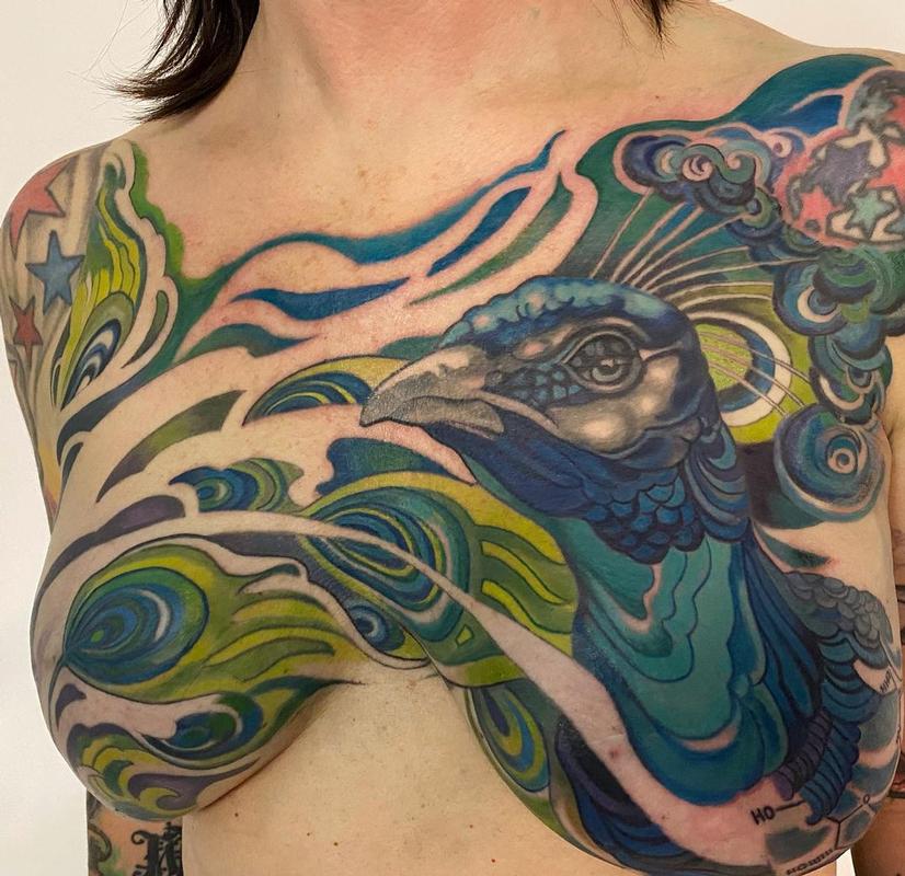 Peacocks tattoos on shoulders
