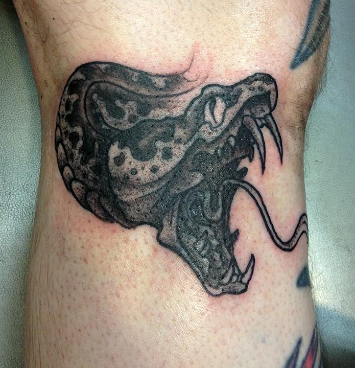 Black Snake Tattoo by Jeff Johnson TattooNOW