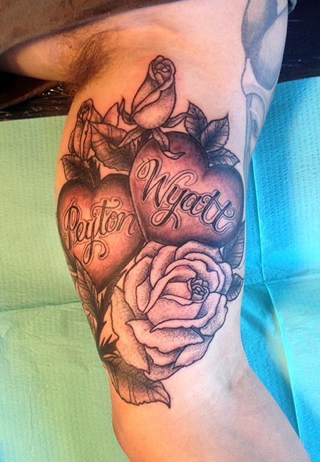 name tattoos with roses for men