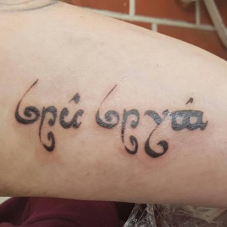 Tattoo uploaded by Shannon Ormandy • JRR Tolkien Elvish script wirting on  spine • Tattoodo