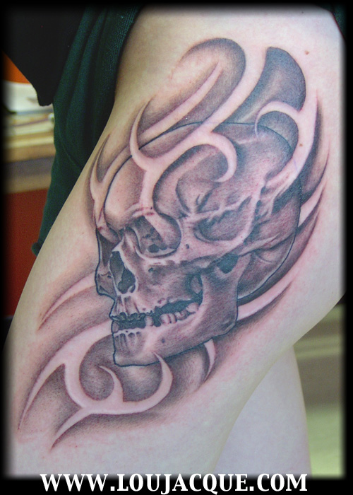 skull w/ negative design by Lou Jacque: TattooNOW